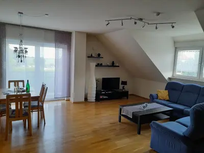 Ein Sitzbereich in der Unterkunft Ferienwohnung am Schoosberg, Niederkirchen bei Deidesheim