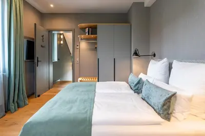 Ein Bett oder Betten in einem Zimmer der Unterkunft Goldammer Aschaffenburg