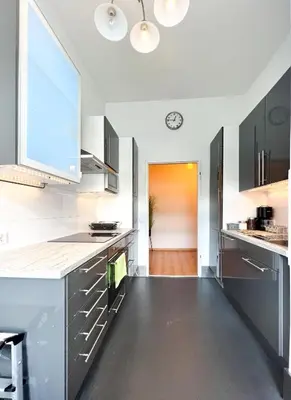 Küche/Küchenzeile in der Unterkunft Bezaubernde Wohnung in zentraler Lage