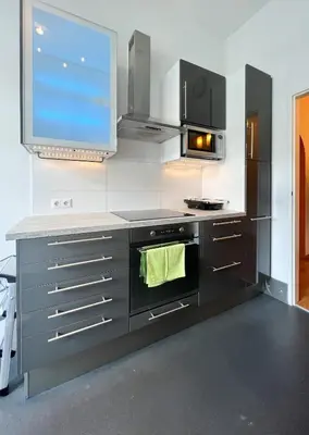 Küche/Küchenzeile in der Unterkunft Bezaubernde Wohnung in zentraler Lage