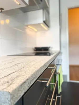Küche/Küchenzeile in der Unterkunft Bezaubernde Wohnung in zentraler Lage