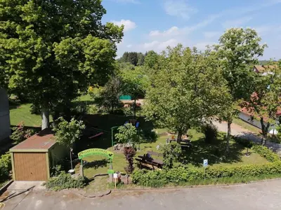 Ein Garten an der Unterkunft Gasthaus Pension Schumbert