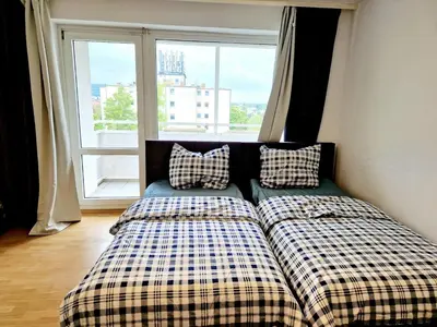 Ein Bett oder Betten in einem Zimmer der Unterkunft Cozy apartment in Auerbach, 55 m², mountain view