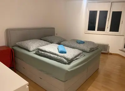 Ein Bett oder Betten in einem Zimmer der Unterkunft Monteurwohnung Karlsruhe - L8 Street