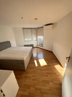 Ein Bett oder Betten in einem Zimmer der Unterkunft Monteurwohnung Karlsruhe - L8 Street