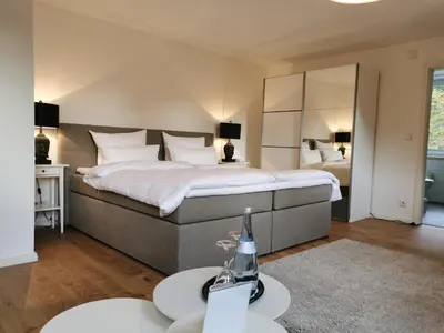 Ein Bett oder Betten in einem Zimmer der Unterkunft Fuchs'sche Mühle