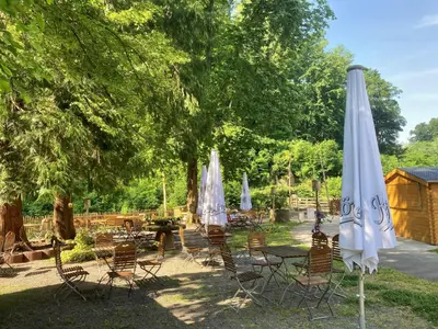 Ein Garten an der Unterkunft Fuchs'sche Mühle