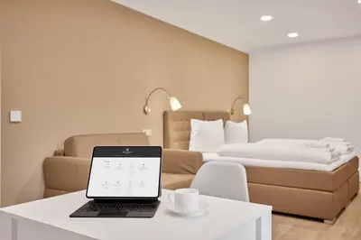 Ein Bett oder Betten in einem Zimmer der Unterkunft Boardinghotel Premium Heidelberg