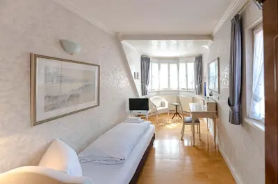 Ein Sitzbereich in der Unterkunft Hotel Leone d´Oro