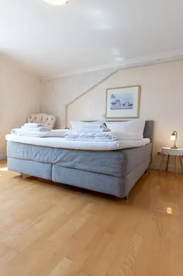 Ein Bett oder Betten in einem Zimmer der Unterkunft Hotel Leone d´Oro