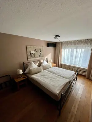 Ein Bett oder Betten in einem Zimmer der Unterkunft stylish suite OldTown free parking Air Condition