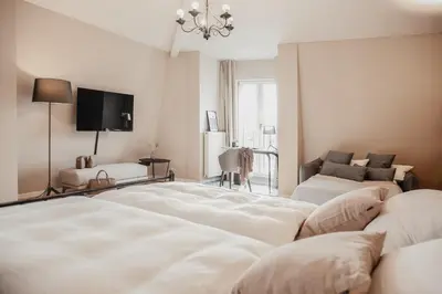 Ein Bett oder Betten in einem Zimmer der Unterkunft Villa Bosco - Boutiquehotel