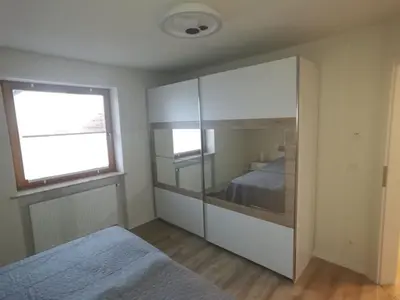 Ein Bett oder Betten in einem Zimmer der Unterkunft Ferienwohnung Fleckenstein
