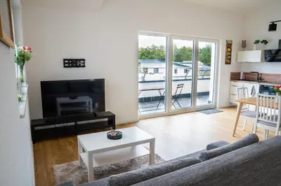 Ein Sitzbereich in der Unterkunft Panorama Suite 20