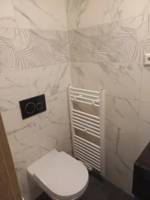 Ein Badezimmer in der Unterkunft Cafe Hotel centrum
