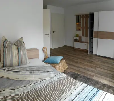 Ein Bett oder Betten in einem Zimmer der Unterkunft Business Apartments Heilbronn