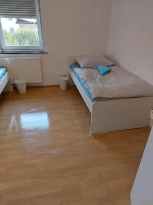 Ein Bett oder Betten in einem Zimmer der Unterkunft L8 Street - Hellmut-Hartert-Straße