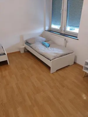 Ein Bett oder Betten in einem Zimmer der Unterkunft L8 Street - Hellmut-Hartert-Straße