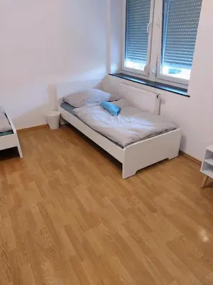 Ein Bett oder Betten in einem Zimmer der Unterkunft L8 Street - Leipziger Straße