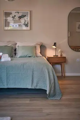 Ein Bett oder Betten in einem Zimmer der Unterkunft Cosima, mit Liebe zum Stil.