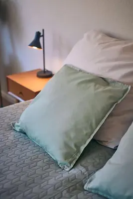 Ein Bett oder Betten in einem Zimmer der Unterkunft Cosima, mit Liebe zum Stil.
