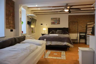 Ein Bett oder Betten in einem Zimmer der Unterkunft C&A Apartments