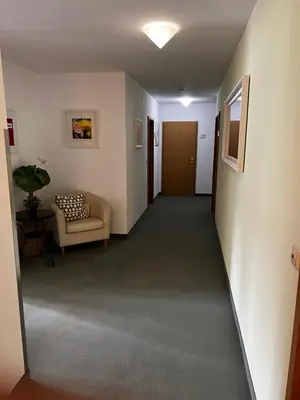 Ein Sitzbereich in der Unterkunft Gästehaus Lena