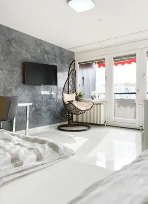 Ein Bett oder Betten in einem Zimmer der Unterkunft Modernes Apartment mit Stil in City Lage