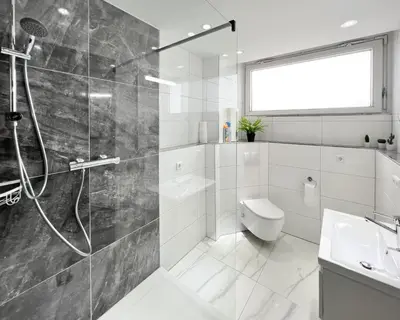 Ein Badezimmer in der Unterkunft Modernes Apartment mit Stil in City Lage