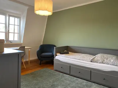 Ein Bett oder Betten in einem Zimmer der Unterkunft Apt5 - Ferienwohnung Brötzingen im 4 OG