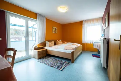 Ein Bett oder Betten in einem Zimmer der Unterkunft Gasthaus Krone