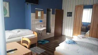 Ein Bett oder Betten in einem Zimmer der Unterkunft Gasthaus Krone