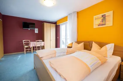 Ein Bett oder Betten in einem Zimmer der Unterkunft Gasthaus Krone