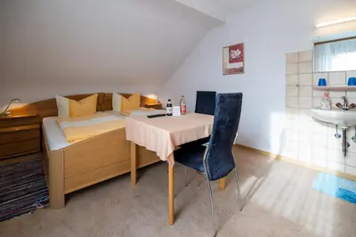 Ein Bett oder Betten in einem Zimmer der Unterkunft Gasthaus Krone
