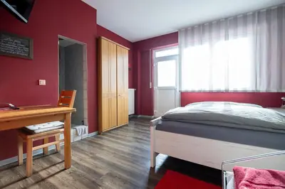 Ein Bett oder Betten in einem Zimmer der Unterkunft Gasthaus Krone