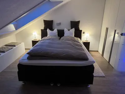 Ein Bett oder Betten in einem Zimmer der Unterkunft 5 Sterne Apartment Auszeit