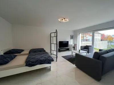 Ein Bett oder Betten in einem Zimmer der Unterkunft Wunderschöne Unterkunft mit Terrasse - 24h7t Checkin