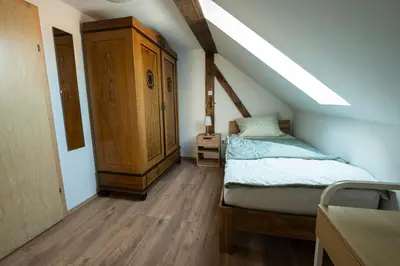 Ein Bett oder Betten in einem Zimmer der Unterkunft Ferienhaus Zum Waldrand