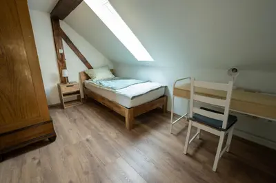Ein Bett oder Betten in einem Zimmer der Unterkunft Ferienhaus Zum Waldrand
