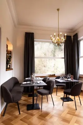 Ein Sitzbereich in der Unterkunft OSCARS Hotel 1415