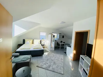 Ein Bett oder Betten in einem Zimmer der Unterkunft Ferienwohnung Casa Blanca