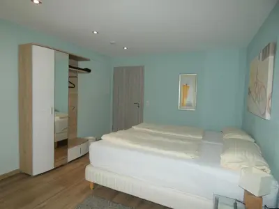 Ein Bett oder Betten in einem Zimmer der Unterkunft Hotel Yel