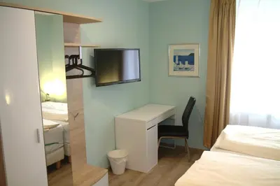 Ein Bett oder Betten in einem Zimmer der Unterkunft Hotel Yel