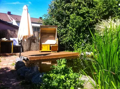 Ein Garten an der Unterkunft Herzensort - Schönes Haus mit Terrasse und Gartenblick