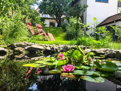 Ein Garten an der Unterkunft Herzensort - Schönes Haus mit Terrasse und Gartenblick
