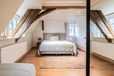 Ein Bett oder Betten in einem Zimmer der Unterkunft Altes Rathaus
