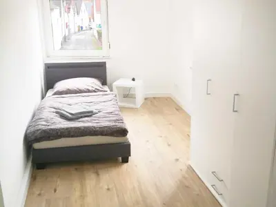 Ein Bett oder Betten in einem Zimmer der Unterkunft Spacious 6 Room Flat *Balcony & Terrace*