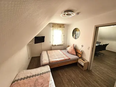 Ein Bett oder Betten in einem Zimmer der Unterkunft Apartment Popp