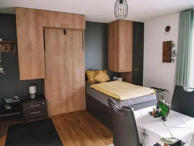 Ein Bett oder Betten in einem Zimmer der Unterkunft Willy´s Ferienzimmer im Tabakdorf Hatzenbühl