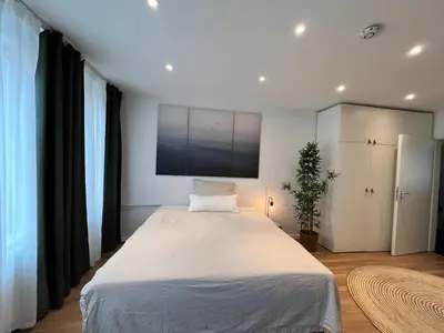 Ein Bett oder Betten in einem Zimmer der Unterkunft Goldstadt Apartments Pforzheim